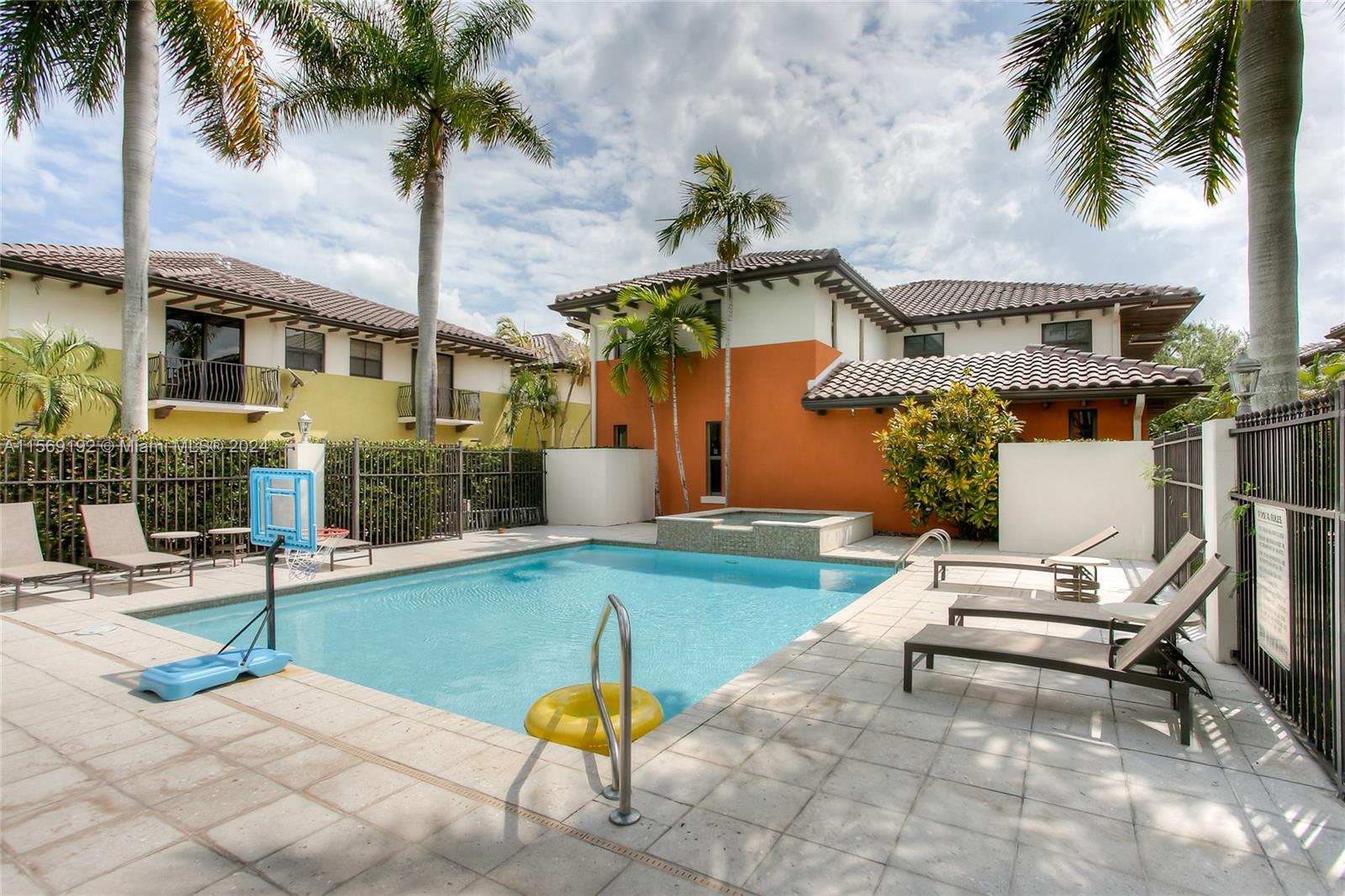 3053 Indiana Street, Unit 12 Miami, FL 33133 - Photo 21 of 23 a swimming pool with outdoor seating