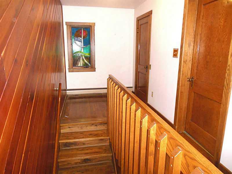 786 Martin Road Indiana, PA 15701 - Photo 9 of 25 Other. Unique & quality define this home. One of several stained glass windows at the top of a beautiful hardwood stair case. Hard woods in the home include: Cherry, Oak, & Hickory.