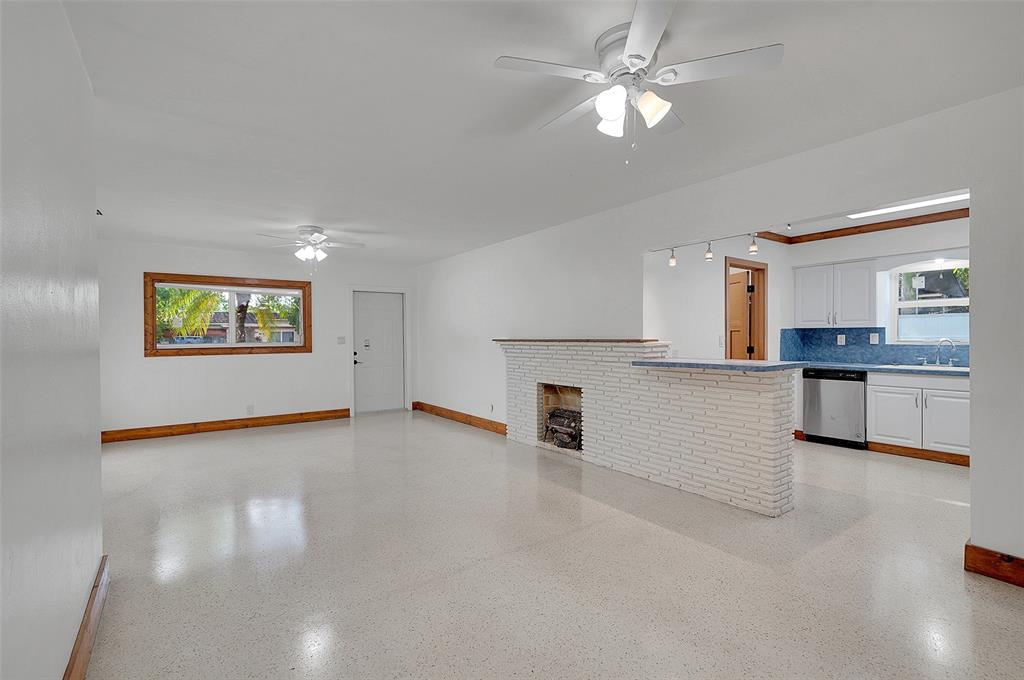 29 Southeast 8th Street Dania Beach, FL 33004 - Photo 13 of 42 a view of a kitchen with a sink cabinets and a kitchen