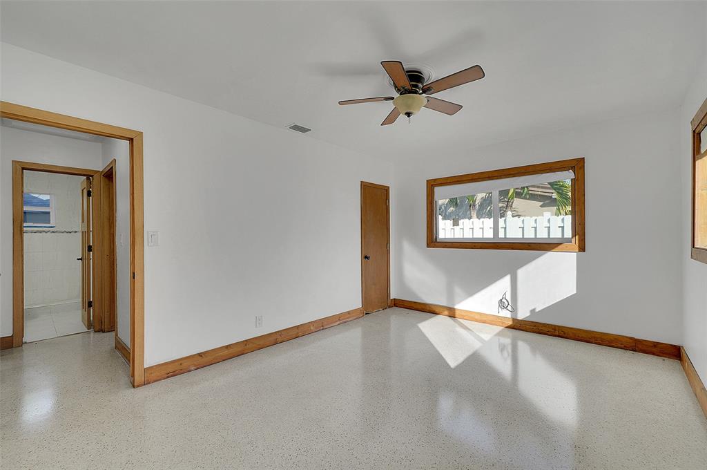 29 Southeast 8th Street Dania Beach, FL 33004 - Photo 22 of 42 a view of a livingroom with a ceiling fan