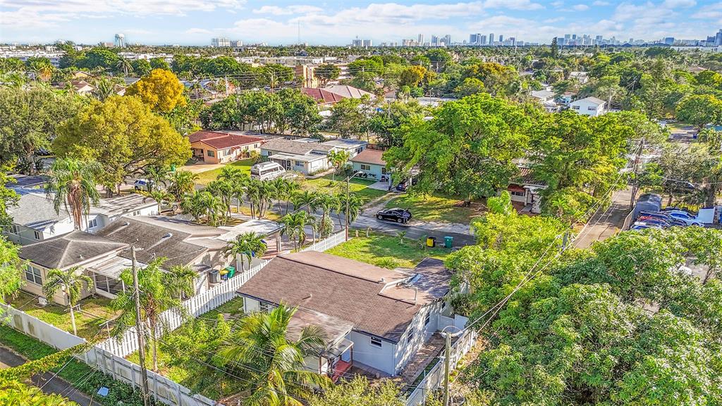 29 Southeast 8th Street Dania Beach, FL 33004 - Photo 29 of 42 an aerial view of residential houses with outdoor space and swimming pool