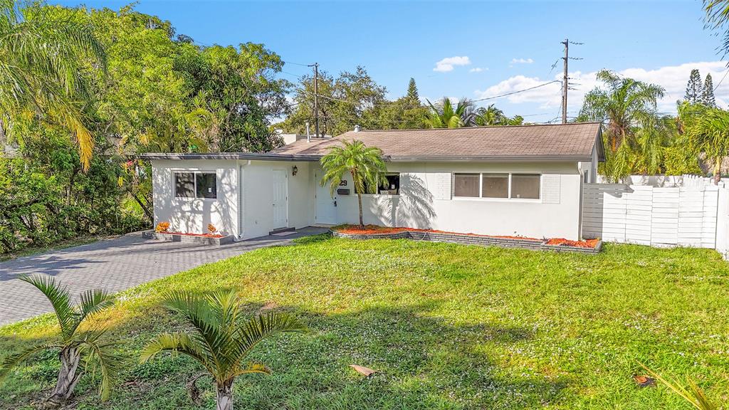 29 Southeast 8th Street Dania Beach, FL 33004 - Photo 6 of 42 a view of a house with backyard and sitting area