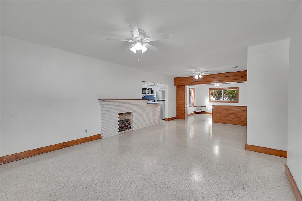 29 Southeast 8th Street Dania Beach, FL 33004 - Photo 9 of 42 a view of a livingroom with a fireplace