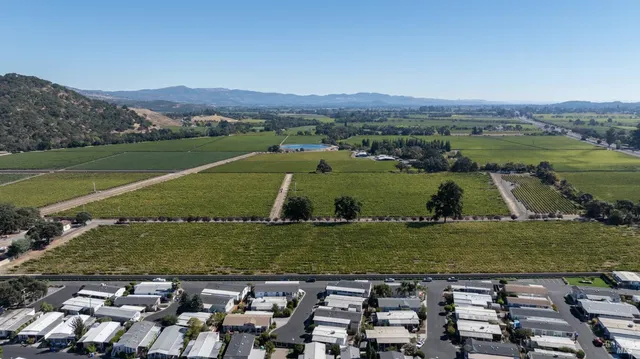 a view of a city with a lake