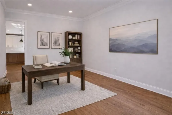 a view of a workspace with furniture