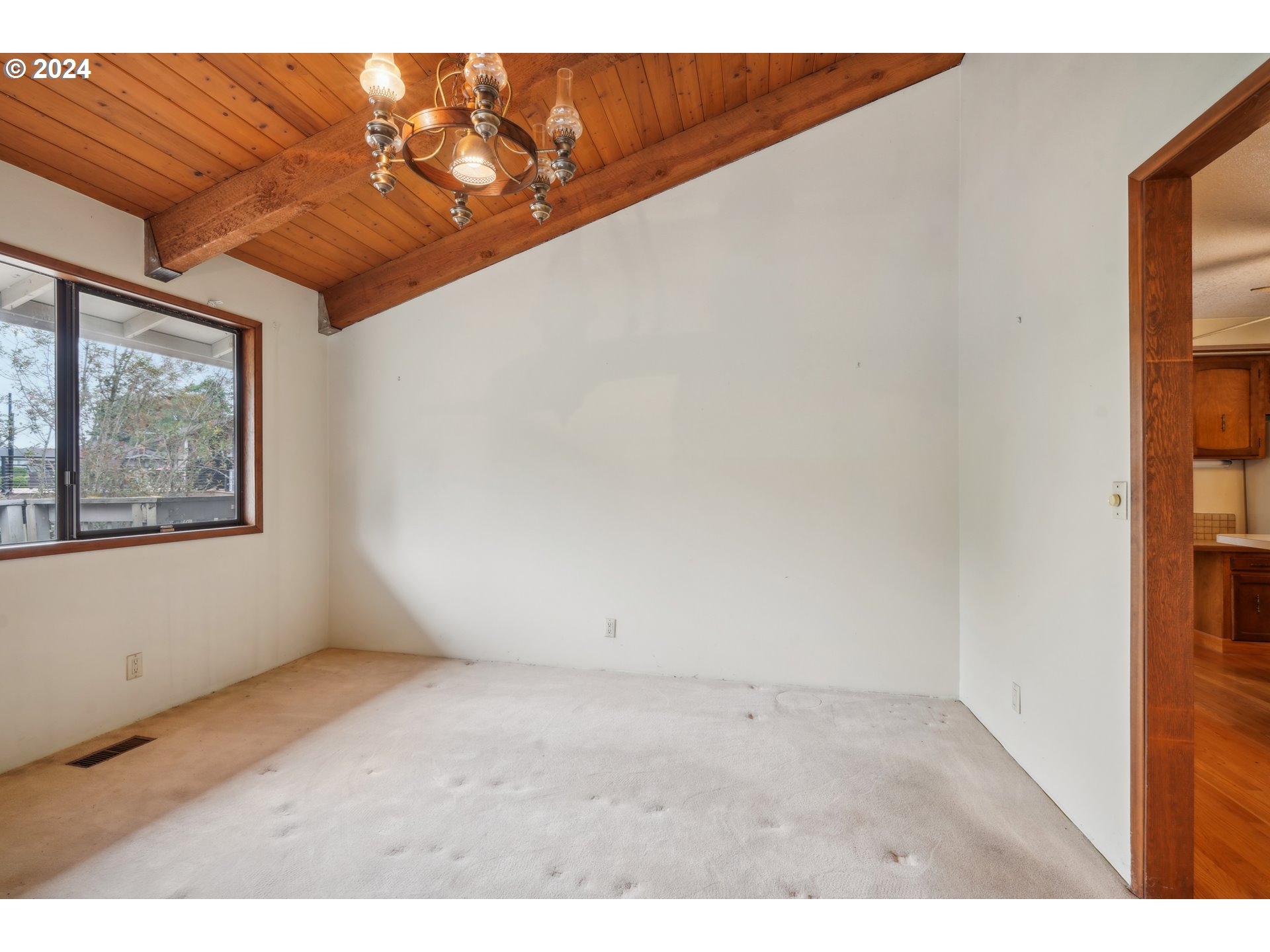 12795 Southeast Callahan Road Happy Valley, OR 97086 - Photo 11 of 42 a view of an empty room with windows