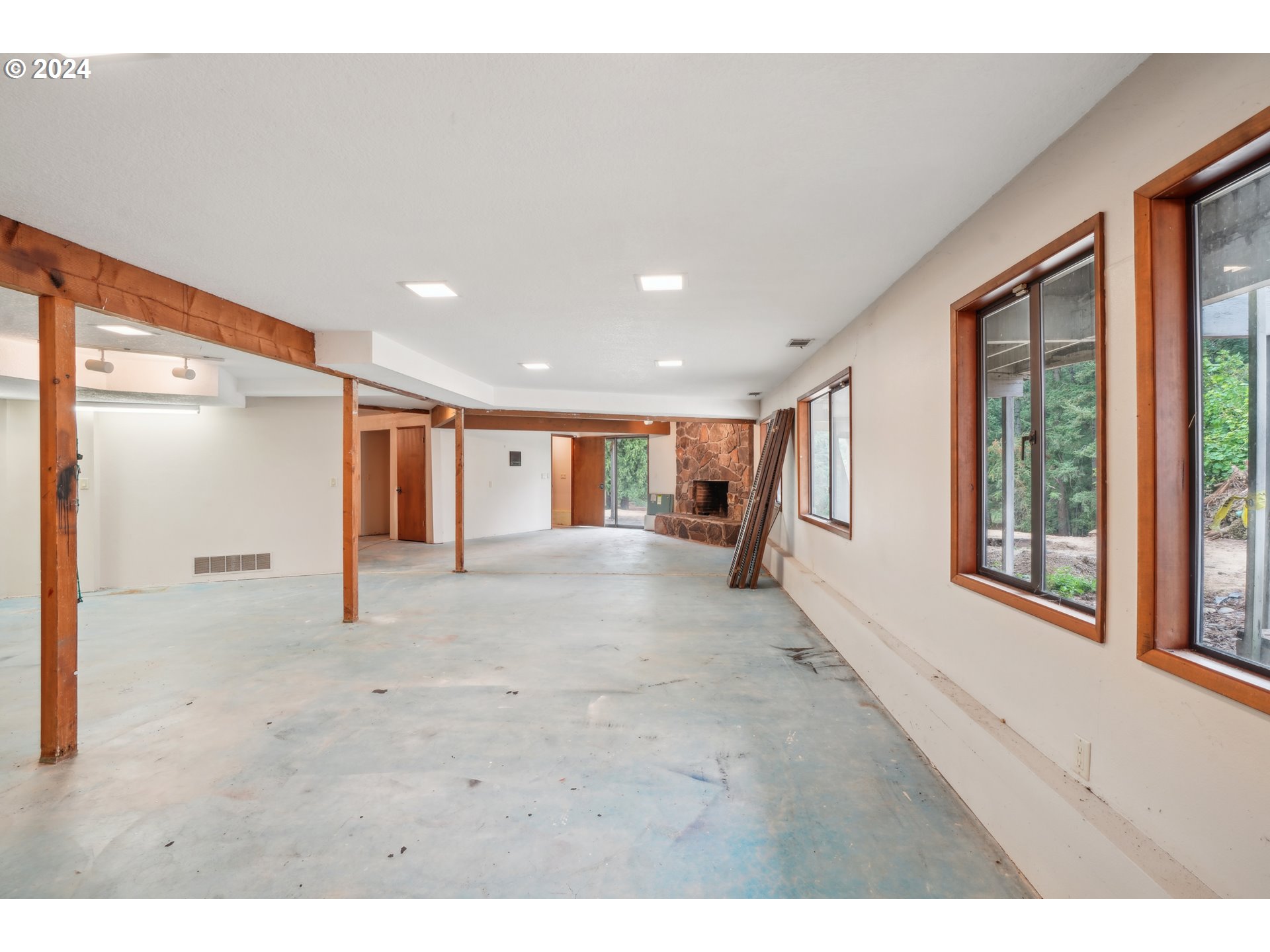 12795 Southeast Callahan Road Happy Valley, OR 97086 - Photo 18 of 42 a view of an empty room with a window
