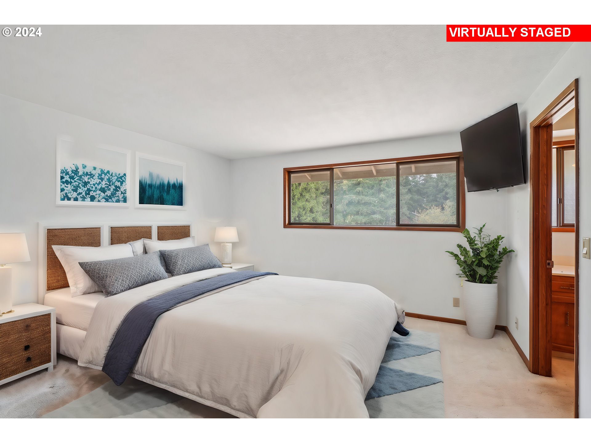 12795 Southeast Callahan Road Happy Valley, OR 97086 - Photo 19 of 42 a bedroom with a large bed and a large window