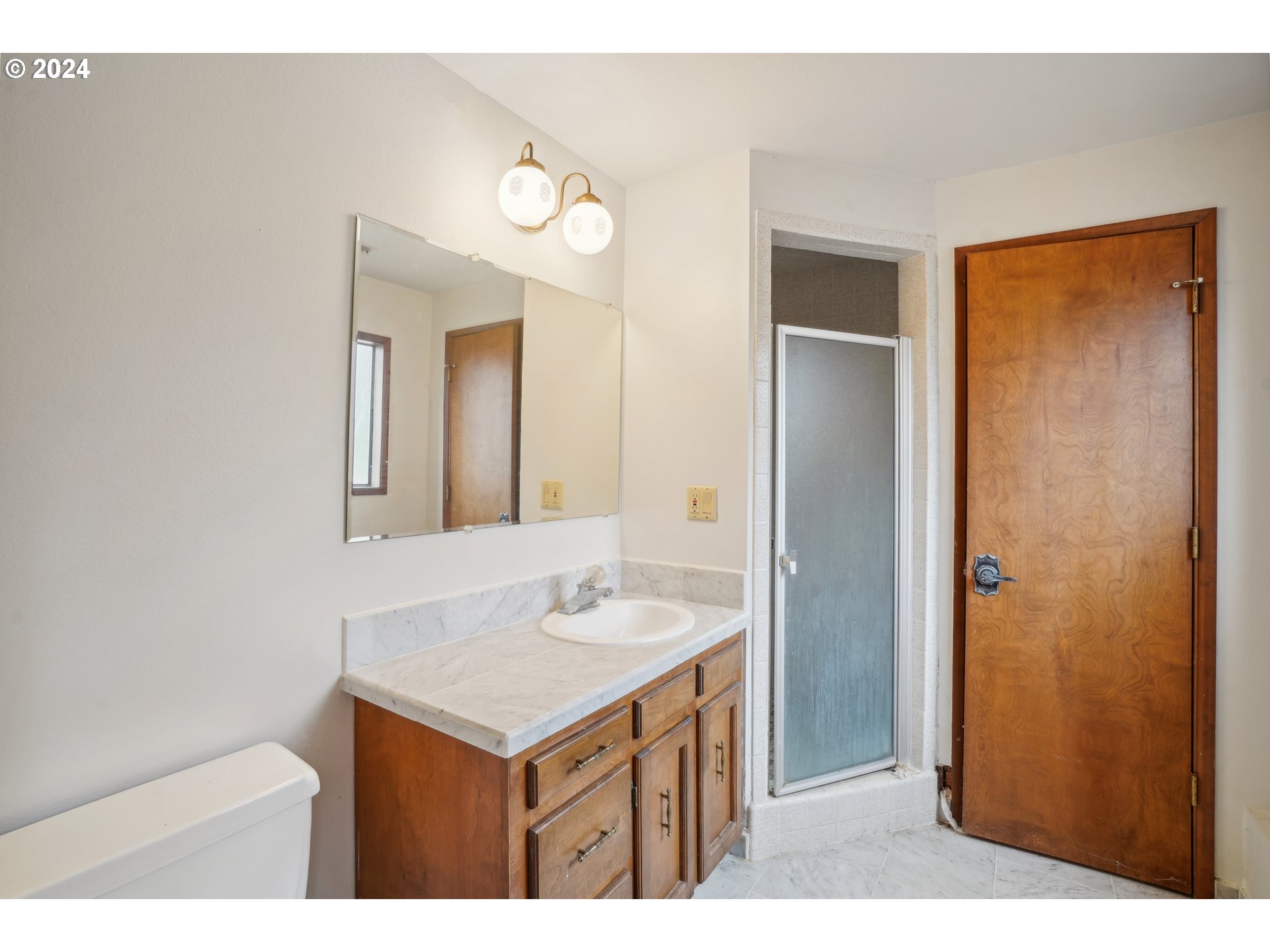 12795 Southeast Callahan Road Happy Valley, OR 97086 - Photo 24 of 42 a bathroom with a sink and a mirror