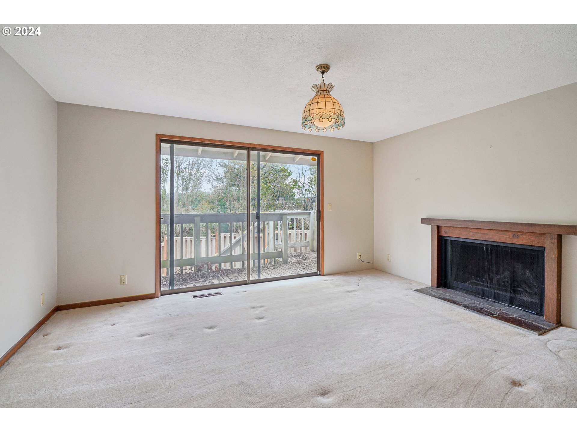 12795 Southeast Callahan Road Happy Valley, OR 97086 - Photo 25 of 42 a view of an empty room with a window