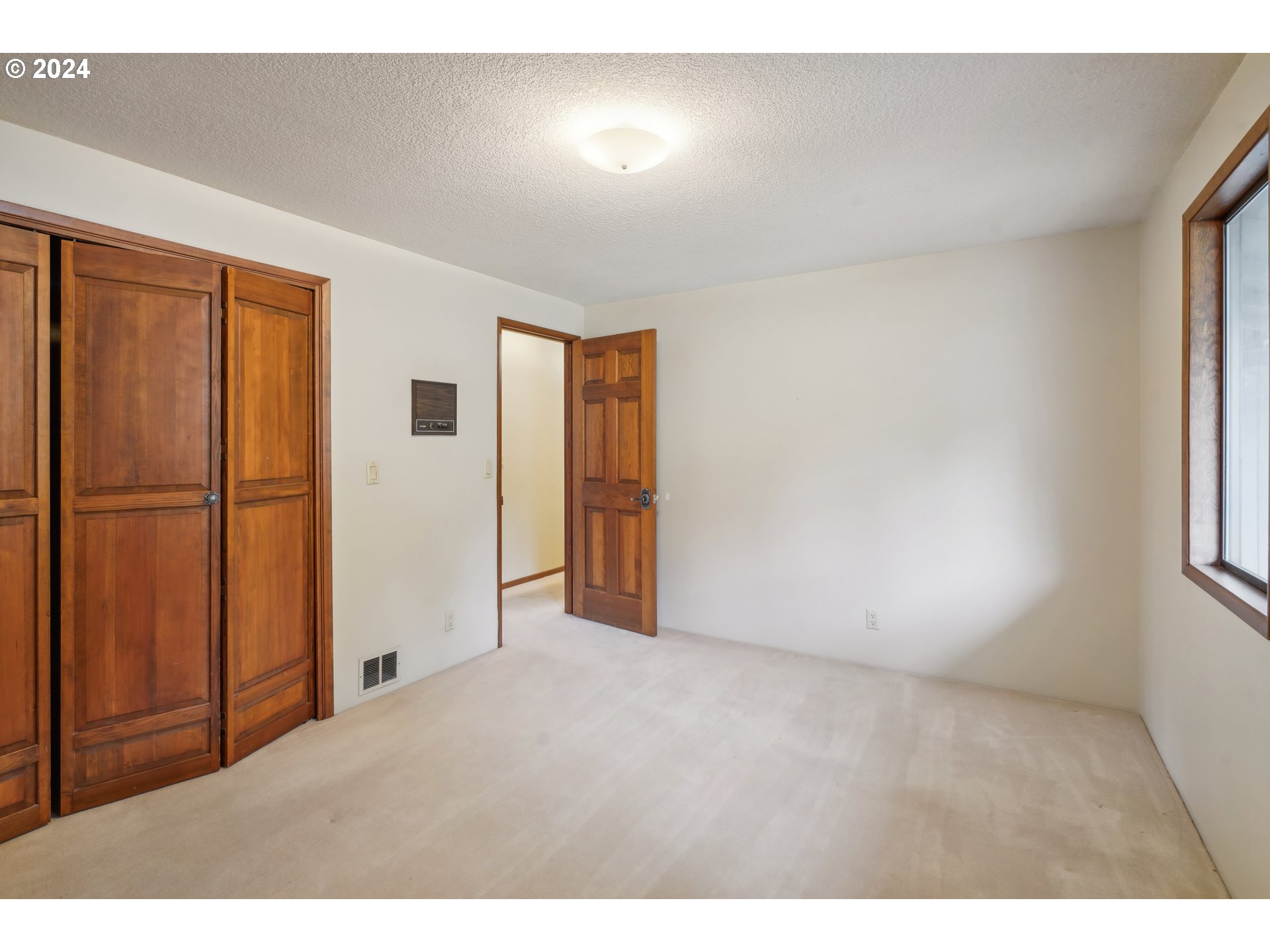12795 Southeast Callahan Road Happy Valley, OR 97086 - Photo 27 of 42 a view of an empty room and window