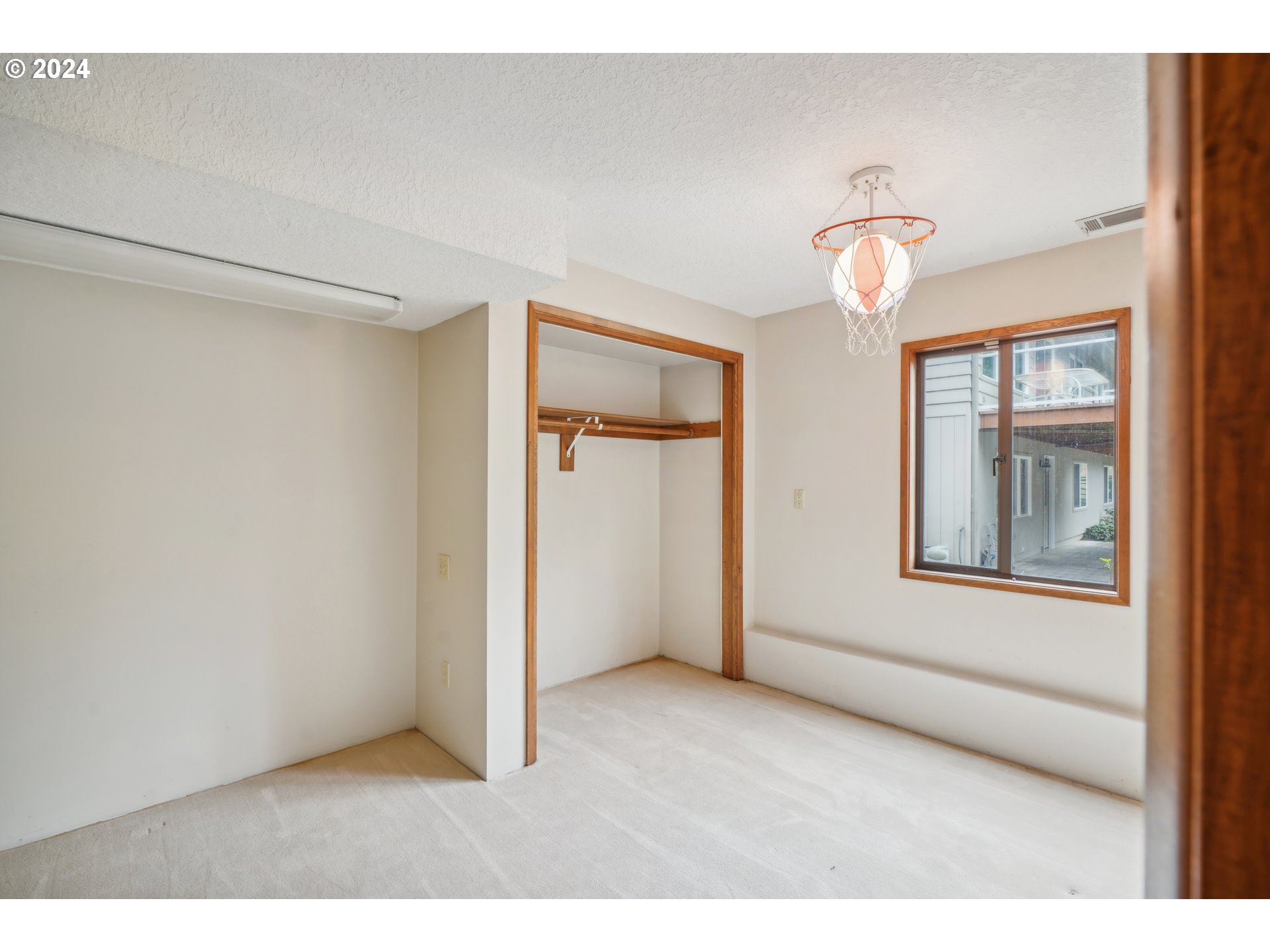 12795 Southeast Callahan Road Happy Valley, OR 97086 - Photo 29 of 42 a view of an empty room with a window