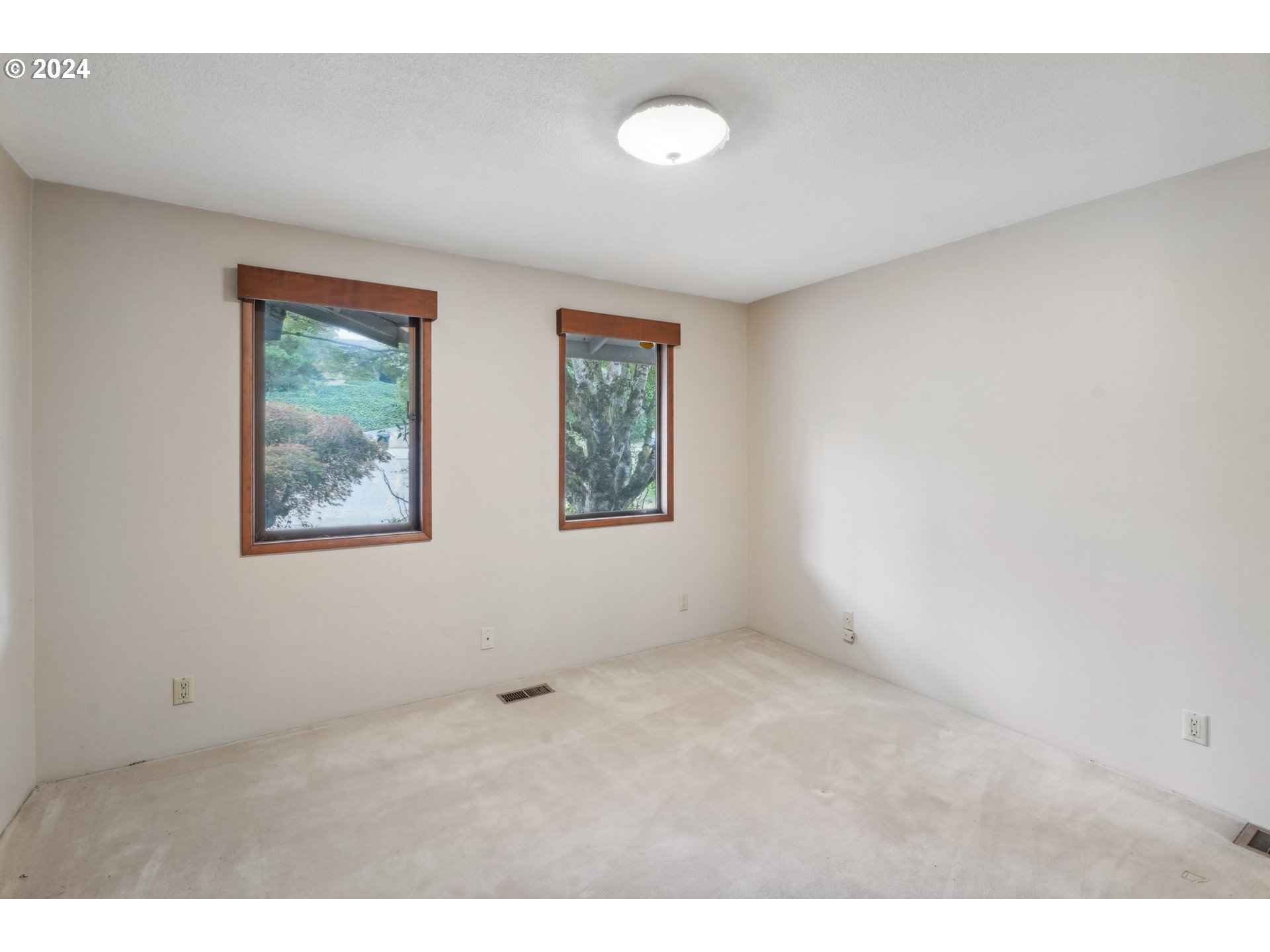 12795 Southeast Callahan Road Happy Valley, OR 97086 - Photo 31 of 42 a view of an empty room with a window