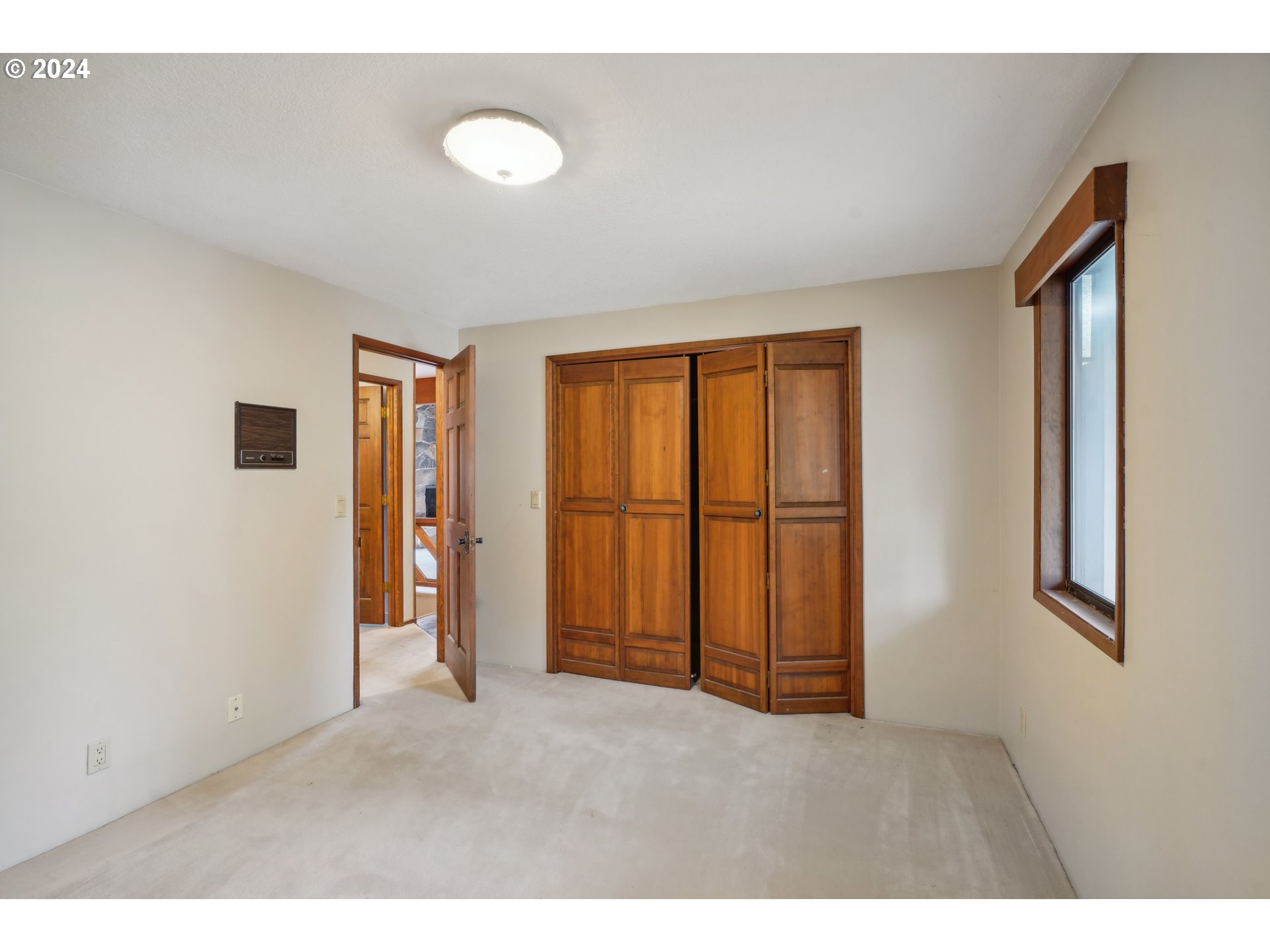 12795 Southeast Callahan Road Happy Valley, OR 97086 - Photo 32 of 42 a view of an empty room with a window