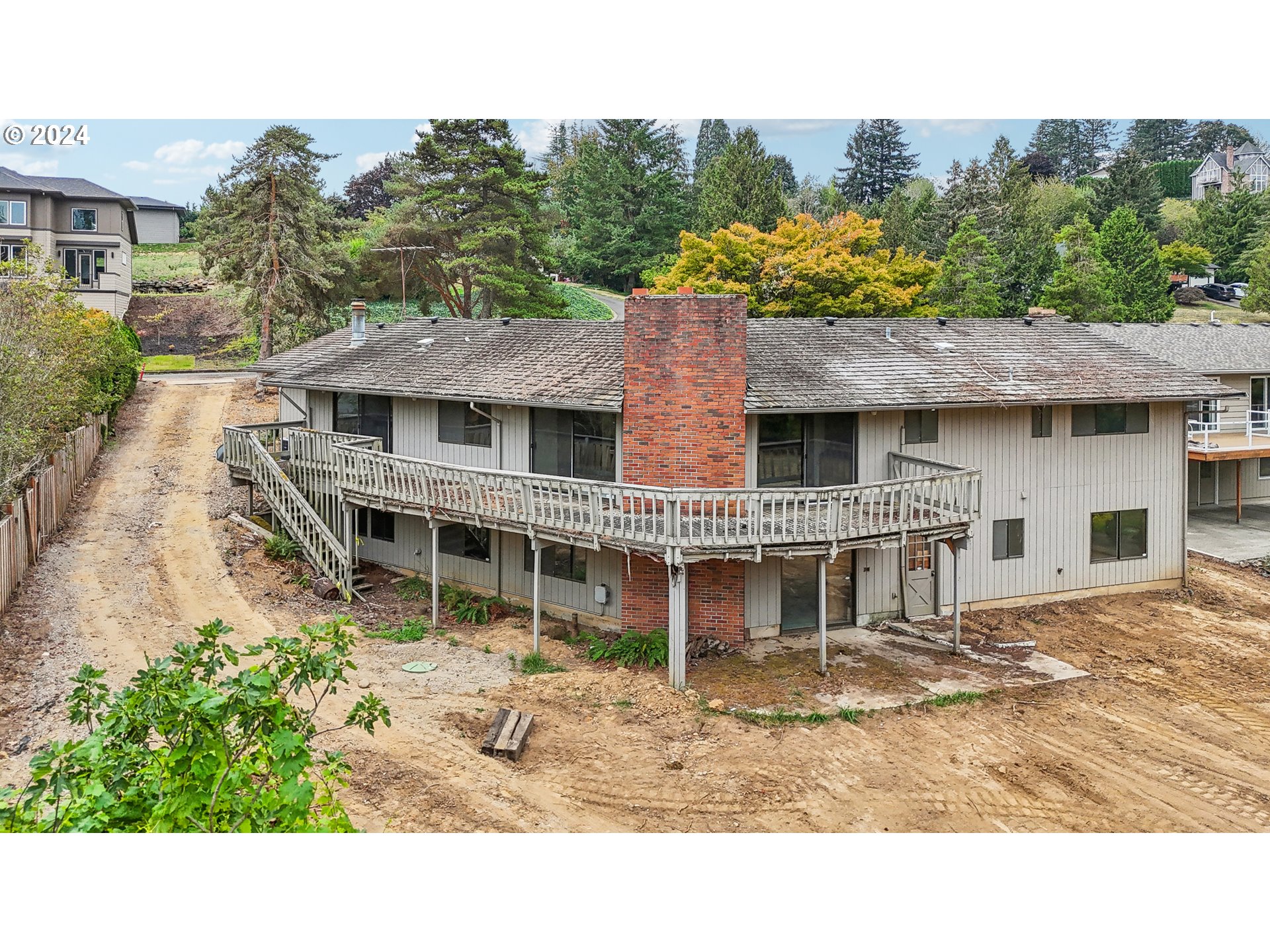 12795 Southeast Callahan Road Happy Valley, OR 97086 - Photo 38 of 42 a house view with a garden space