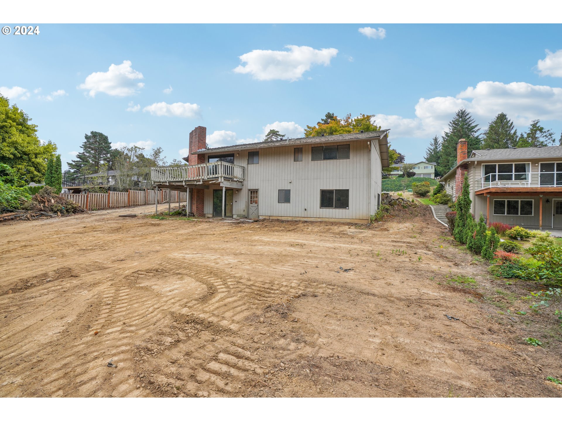 12795 Southeast Callahan Road Happy Valley, OR 97086 - Photo 39 of 42 a view of a house with a yard