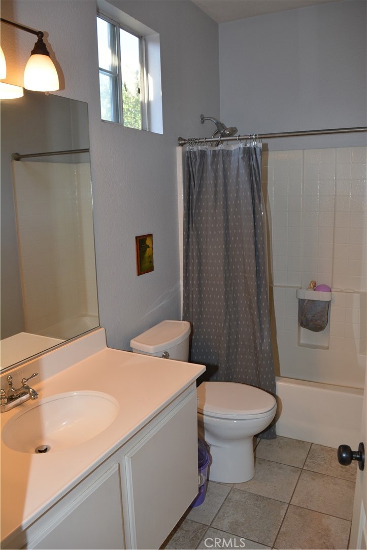 119 Draft Way Placentia, CA 92870 - Photo 15 of 24 a bathroom with a sink toilet and shower