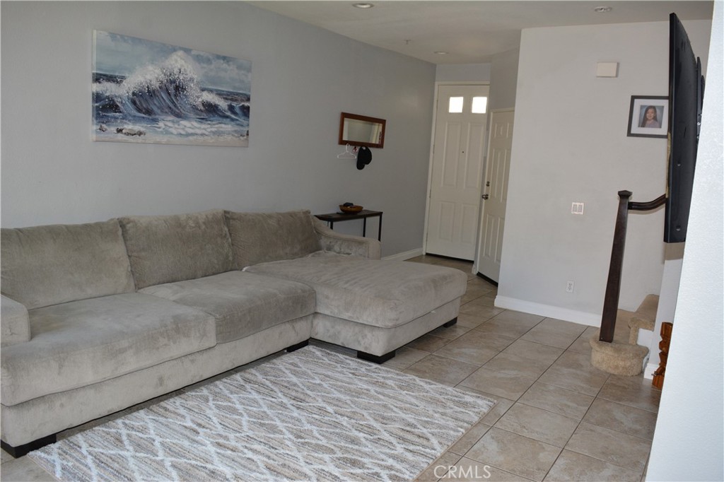 119 Draft Way Placentia, CA 92870 - Photo 4 of 24 a living room with furniture and a rug
