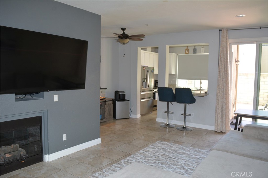 119 Draft Way Placentia, CA 92870 - Photo 5 of 24 a living room with furniture and a flat screen tv