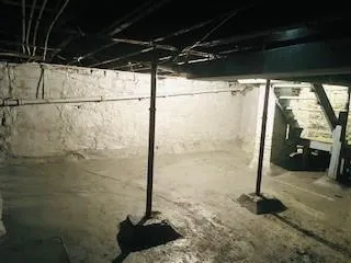 a view of a house with a yard and garage