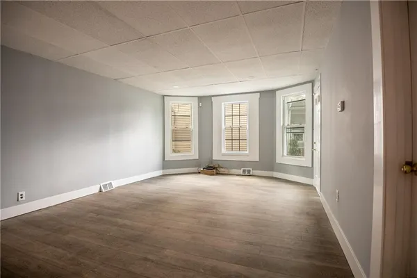 an empty room with windows