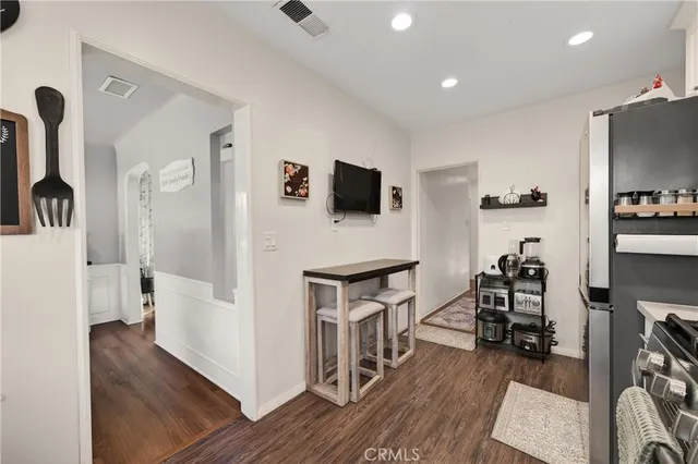 a livingroom with furniture and wooden floor