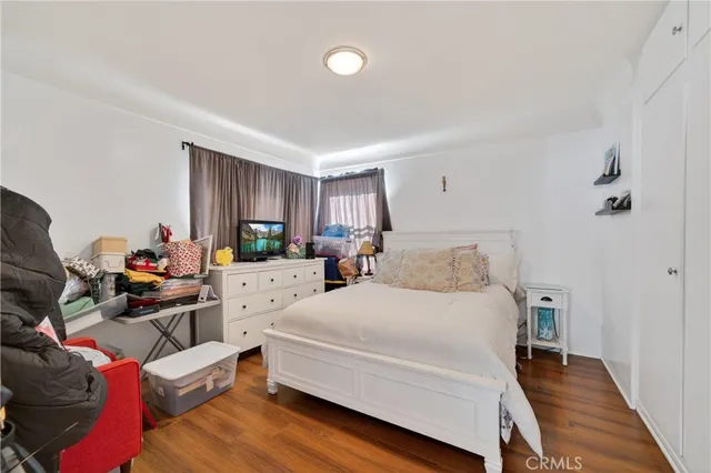 a large white bed in a white room