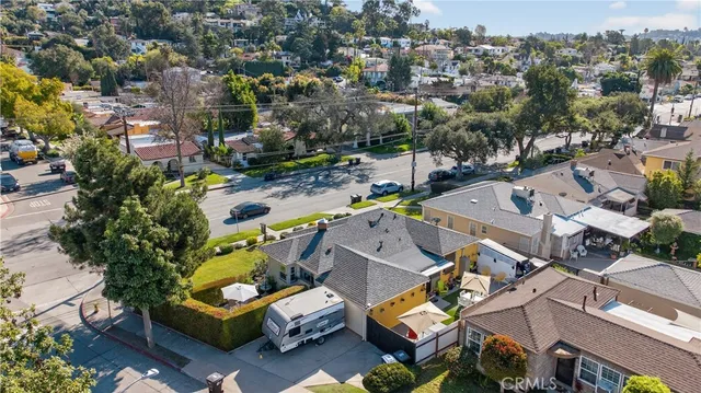 an aerial view of a swimming pool patio and mountain view