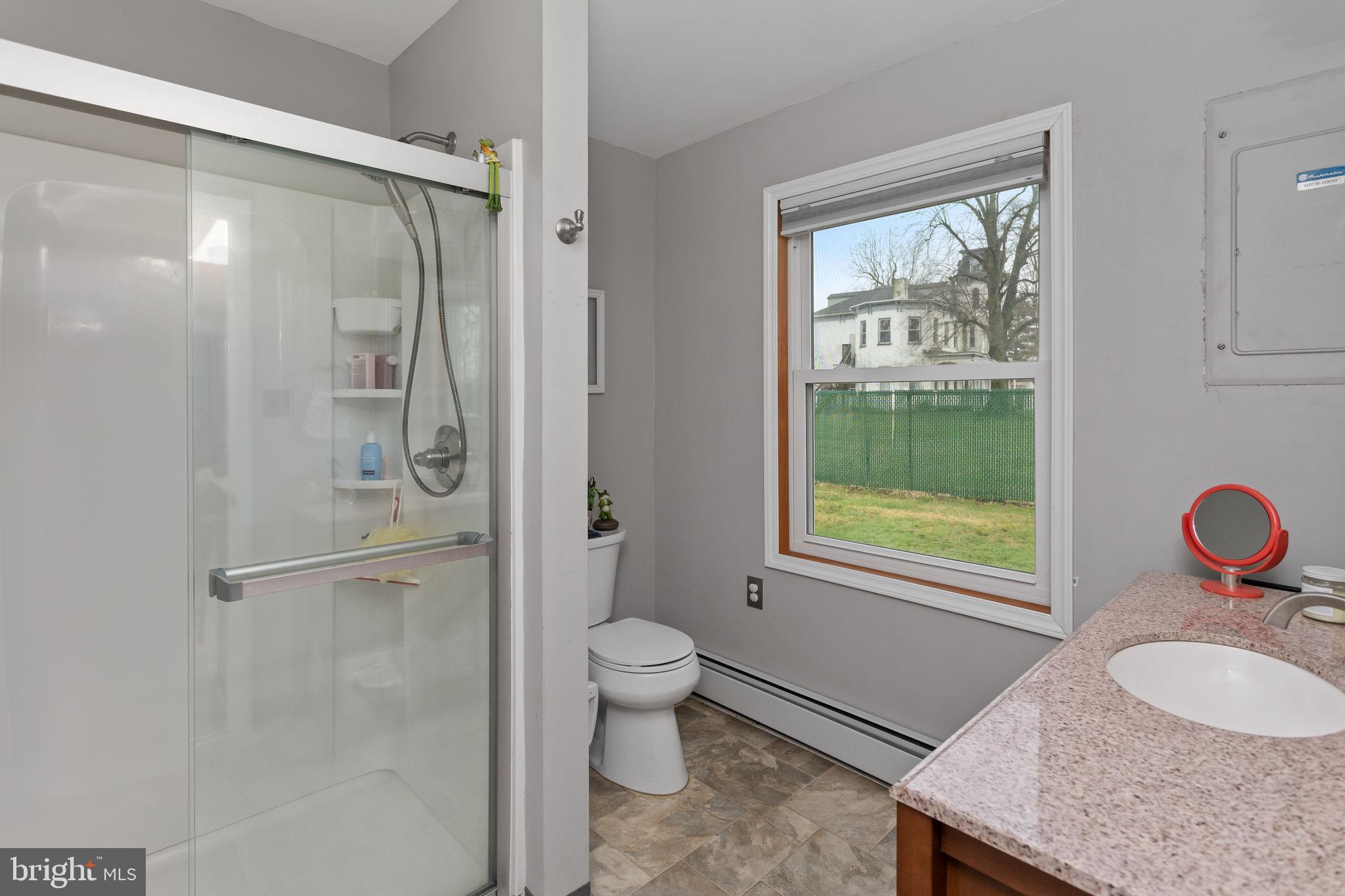 181 Crosswicks Chesterfield Road Chesterfield, NJ 08515 - Photo 20 of 32 a bathroom with a granite countertop sink toilet and shower