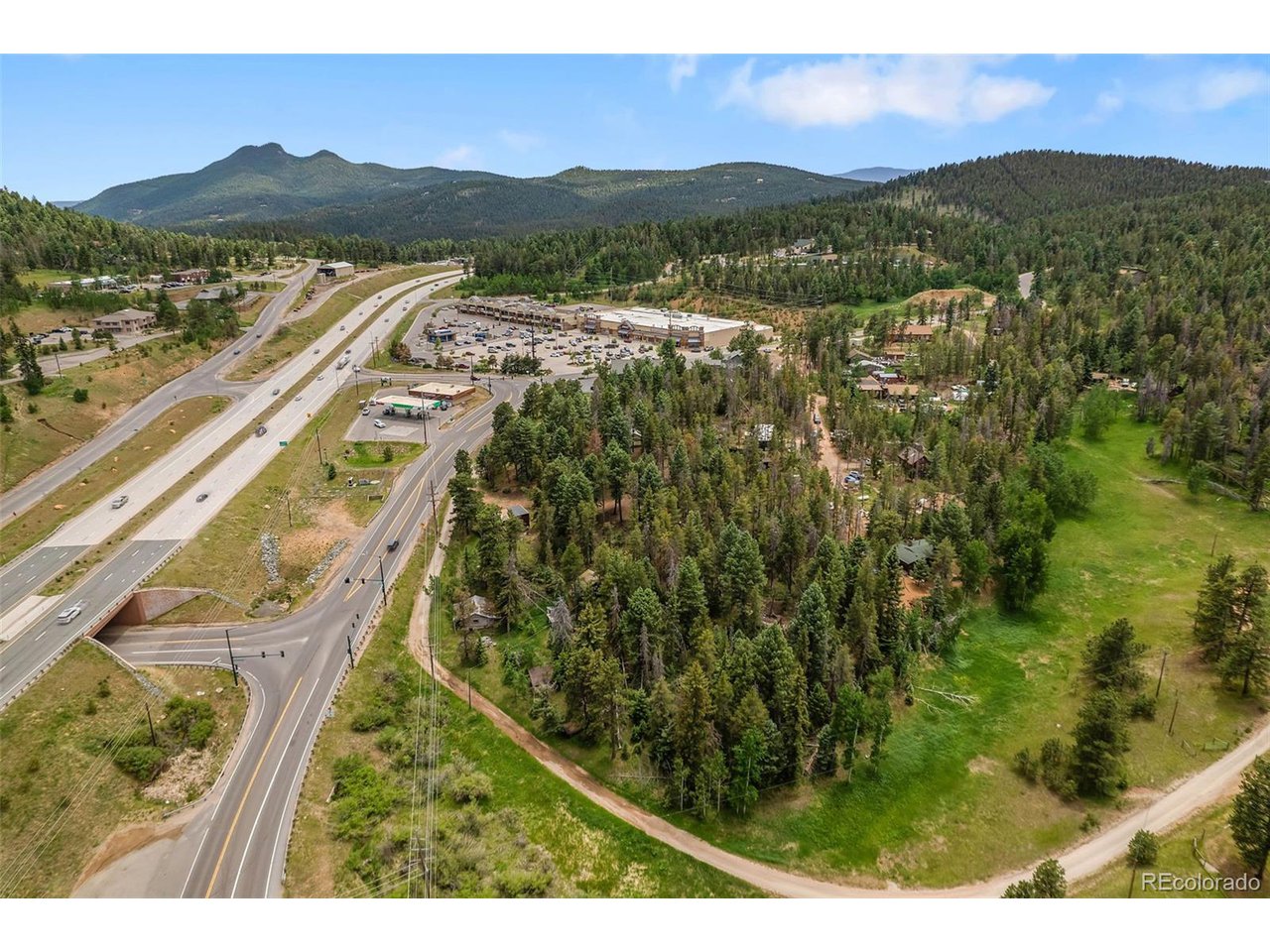 26824 Rascal Lane Conifer, CO 80433 - Photo 2 of 12 An ideal foothills location combining mountain scenery with exceptional year-round accessibility.