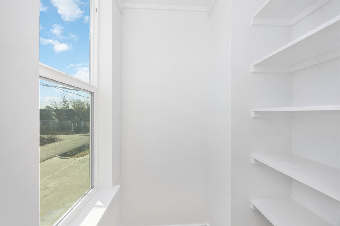 7710 Independence Street, Unit A Houston, TX 77051 - Photo 16 of 25 a view of a glass door and a window