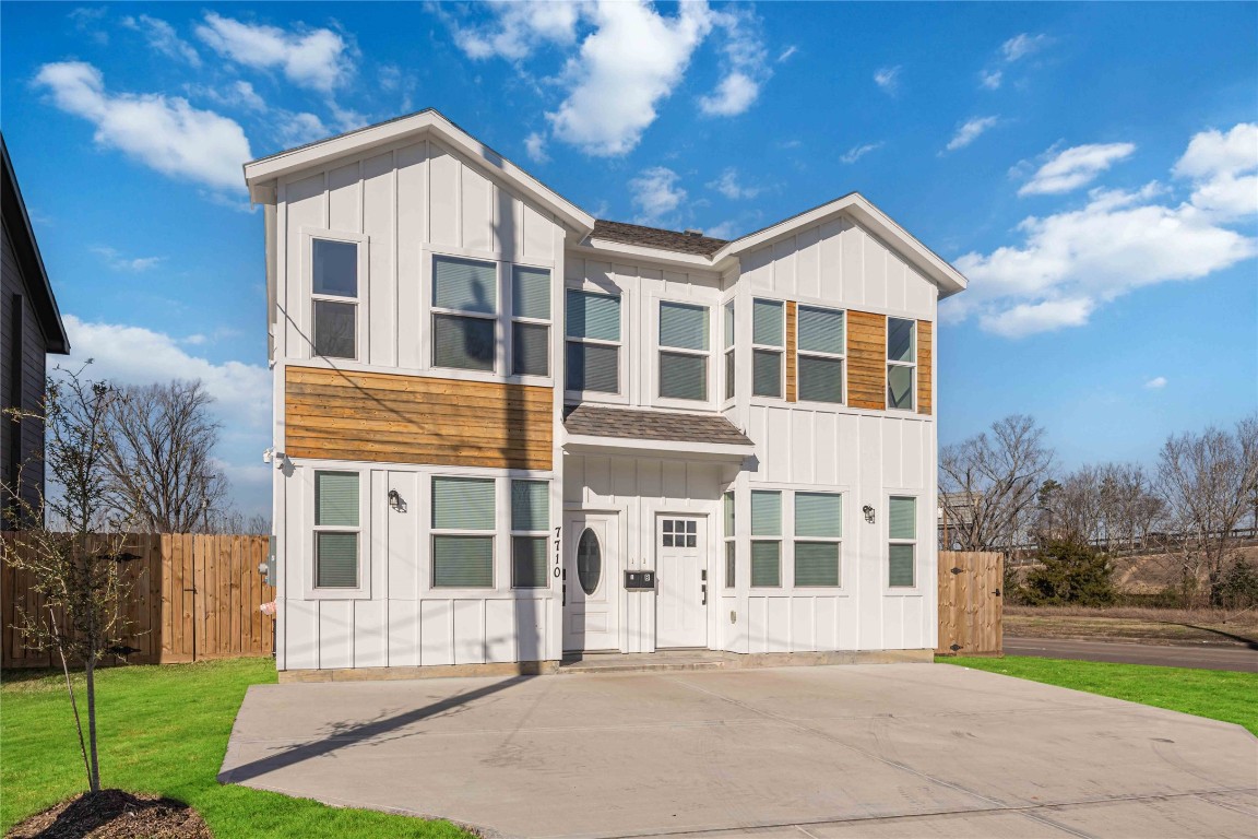 7710 Independence Street, Unit A Houston, TX 77051 - Photo 2 of 25 a front view of a house with a yard