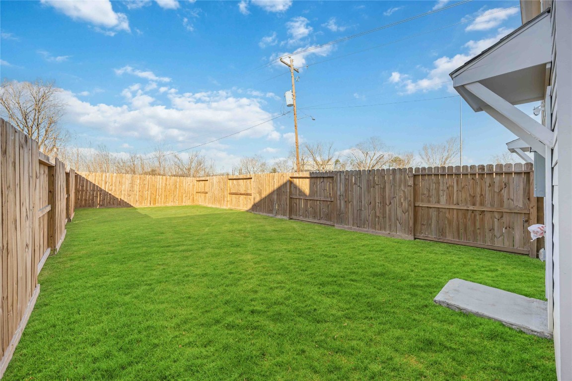 7710 Independence Street, Unit A Houston, TX 77051 - Photo 23 of 25 a view of a backyard with staircase