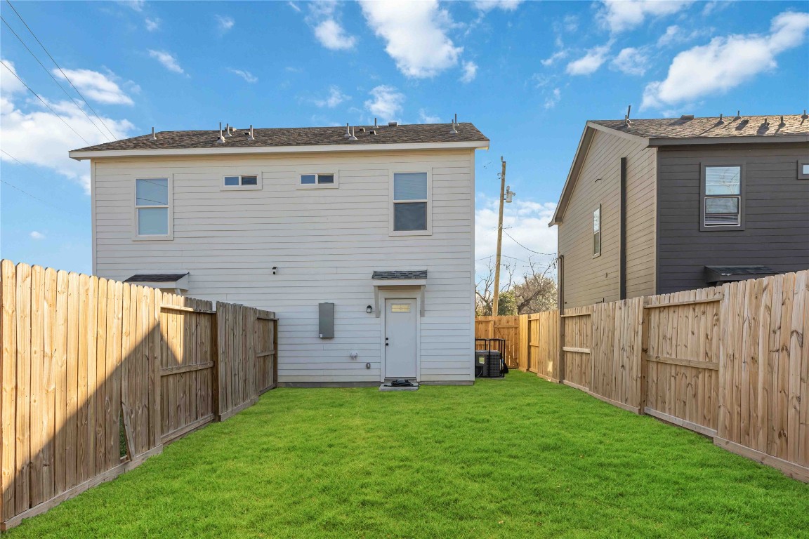 7710 Independence Street, Unit A Houston, TX 77051 - Photo 24 of 25 a backyard of a house with wooden fence