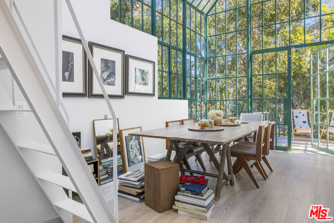 2456 Astral Drive Los Angeles, CA 90046 - Photo 13 of 33 a view of a dining room with furniture window and outside view