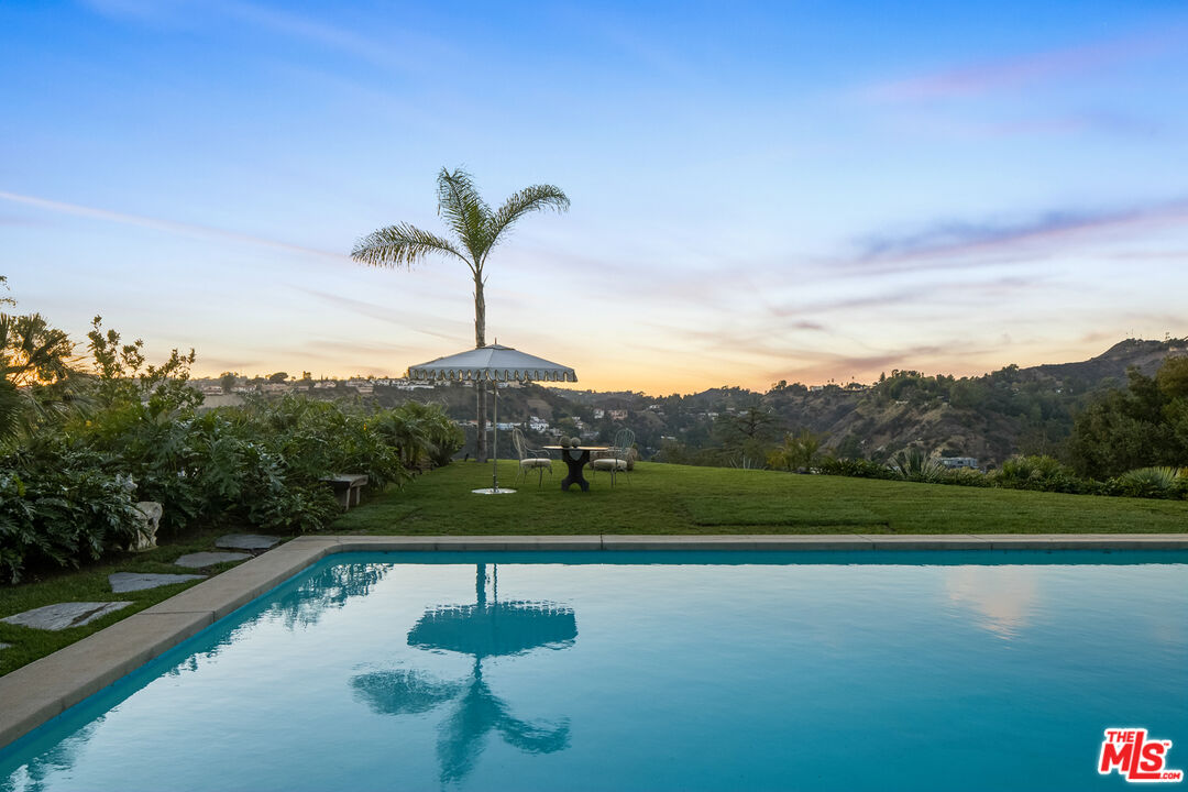2456 Astral Drive Los Angeles, CA 90046 - Photo 32 of 33 a view of a lake with a yard