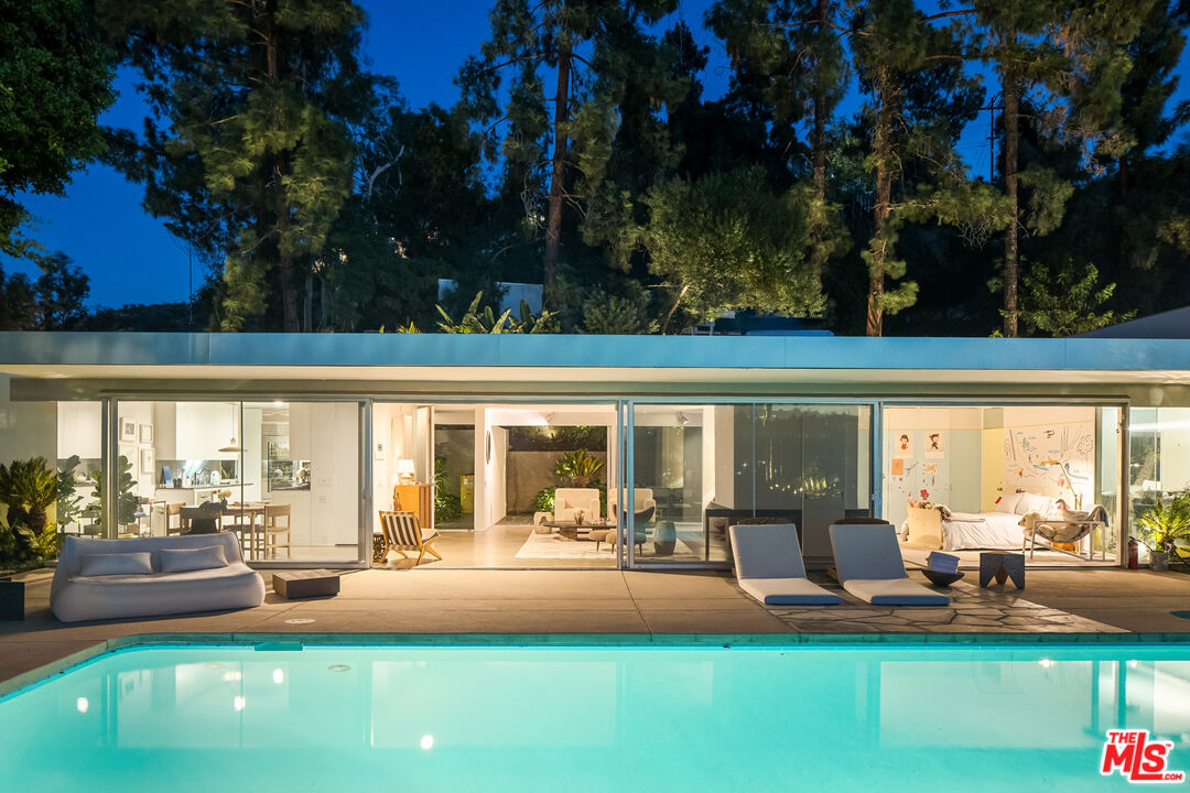 2456 Astral Drive Los Angeles, CA 90046 - Photo 33 of 33 a front view of a house with garden and patio