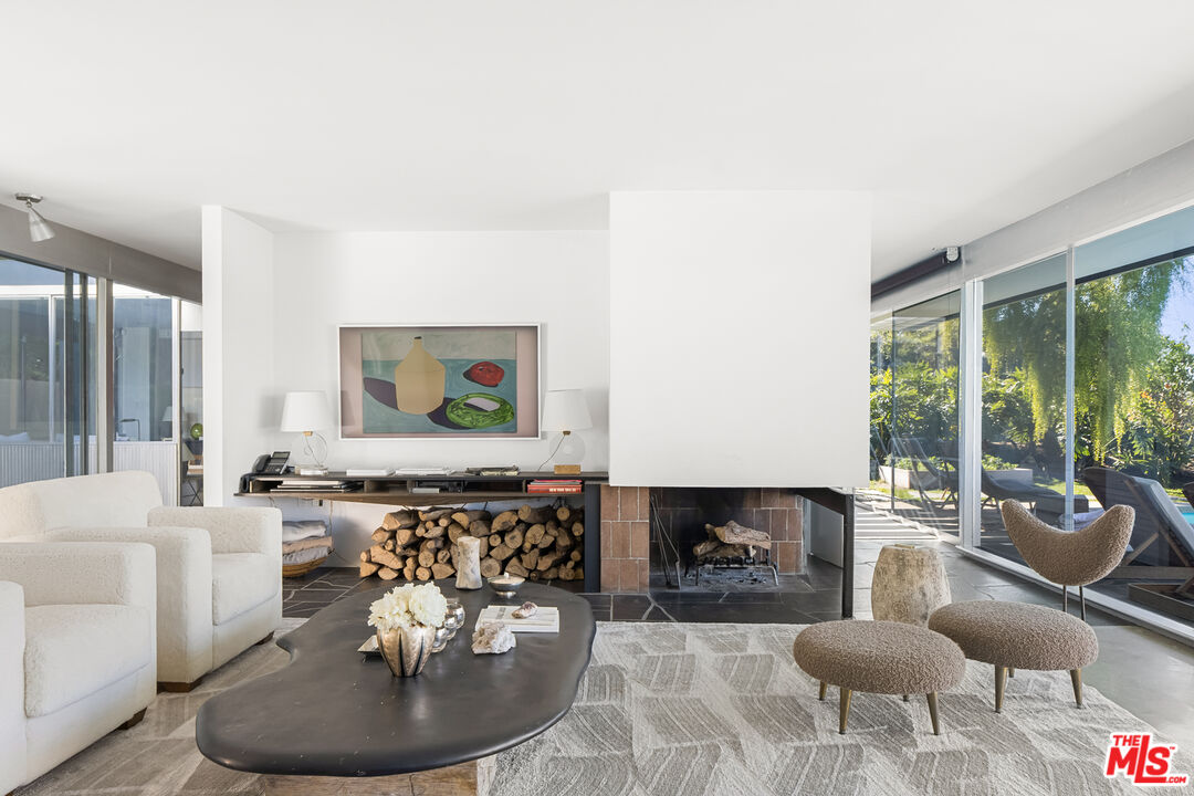 2456 Astral Drive Los Angeles, CA 90046 - Photo 5 of 33 a living room with furniture and a large window