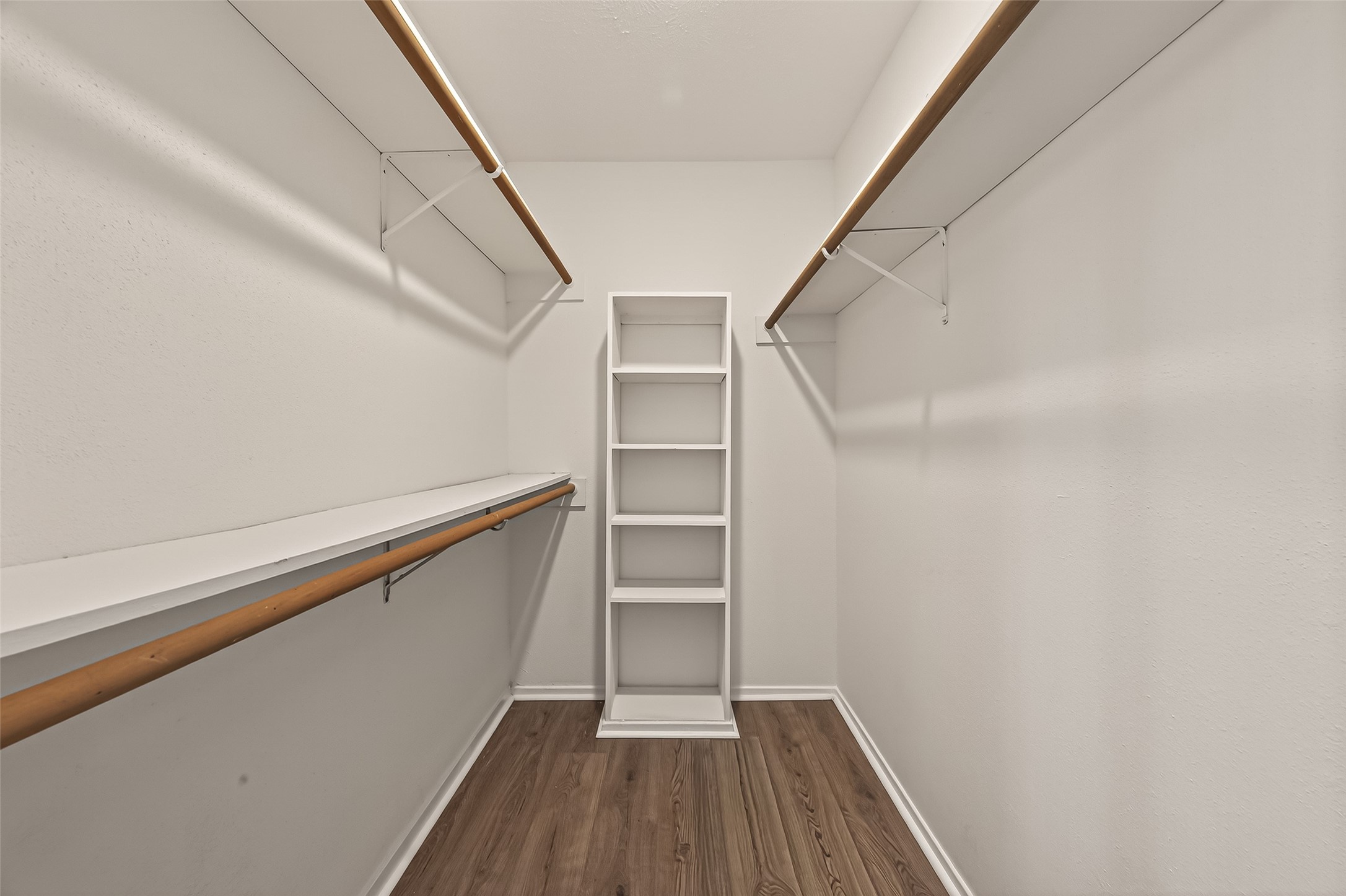 7313 Gulf Freeway, Unit 904 Houston, TX 77017 - Photo 26 of 27 a view of walk in closet with wooden floor