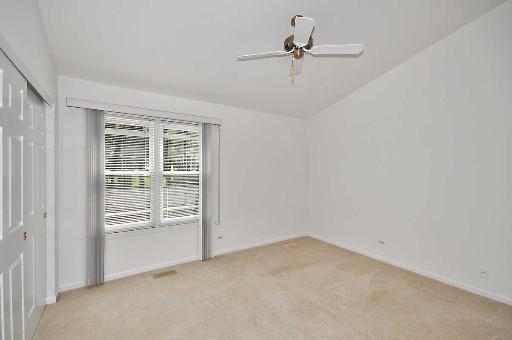 41 Bedford Road Mundelein, IL 60060 - Photo 11 of 16 a view of an empty room with a window
