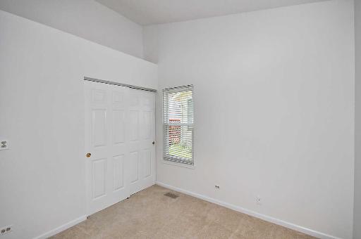41 Bedford Road Mundelein, IL 60060 - Photo 12 of 16 a view of an empty room with a window