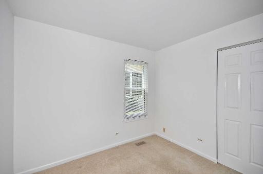 41 Bedford Road Mundelein, IL 60060 - Photo 13 of 16 an empty room with windows