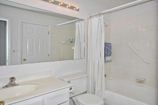 41 Bedford Road Mundelein, IL 60060 - Photo 14 of 16 a bathroom with a sink a toilet and shower