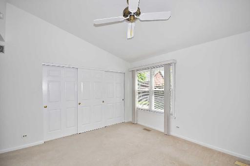 41 Bedford Road Mundelein, IL 60060 - Photo 9 of 16 a view of an empty room with a window