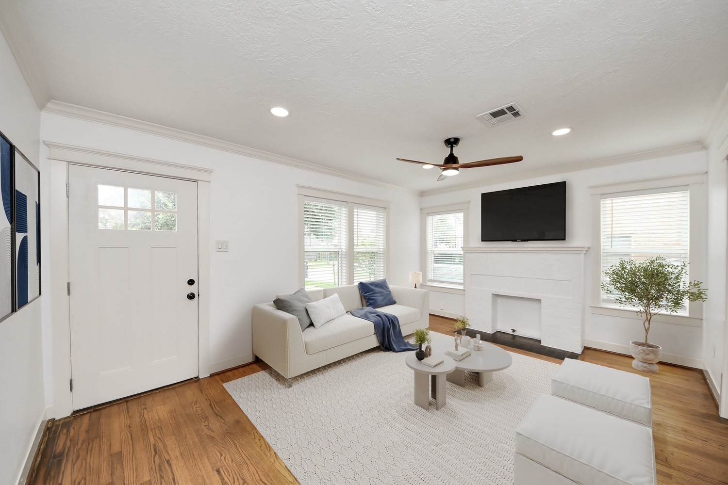 609 Reid Street Houston, TX 77022 - Photo 5 of 50 Living room opens up to the breakfast area. Virtually stage