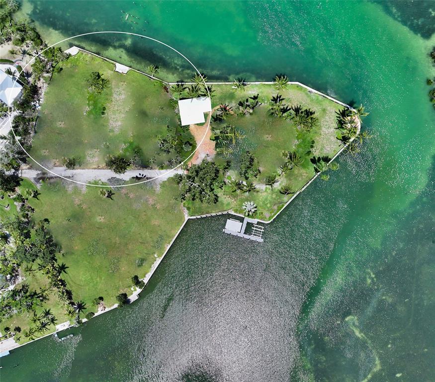 6516 Bayou Hammock Road Longboat Key, FL 34228 - Photo 12 of 20 an aerial view of a residential houses with outdoor space and garden