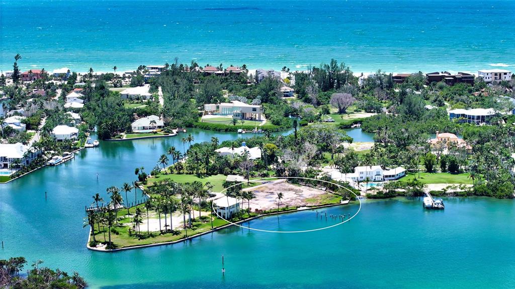 6516 Bayou Hammock Road Longboat Key, FL 34228 - Photo 14 of 20 an aerial view of a houses with a yard
