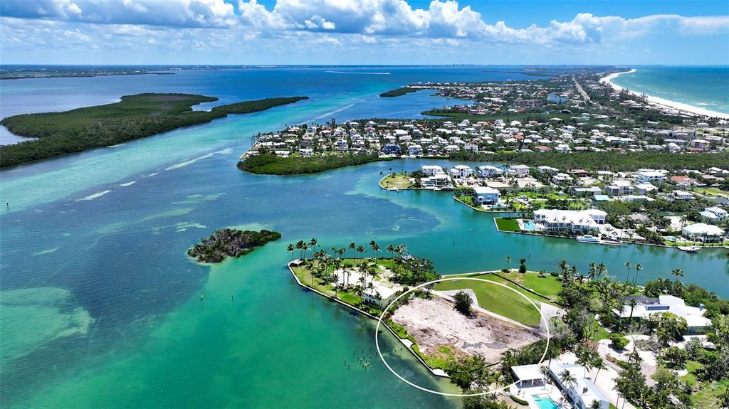 6516 Bayou Hammock Road Longboat Key, FL 34228 - Photo 18 of 20 a view of a lake in a city