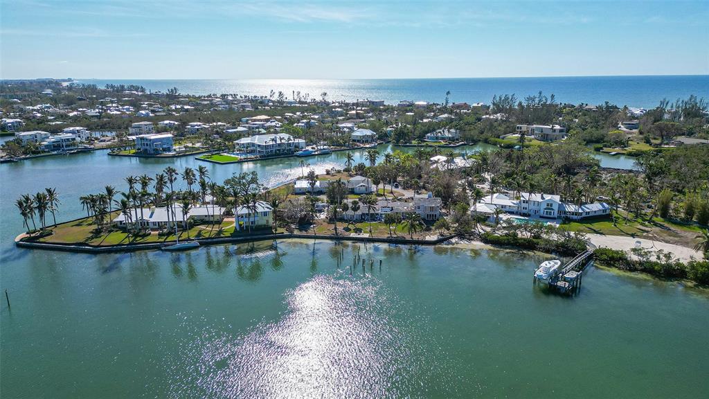 6516 Bayou Hammock Road Longboat Key, FL 34228 - Photo 2 of 20 an aerial view of a residential houses with outdoor space