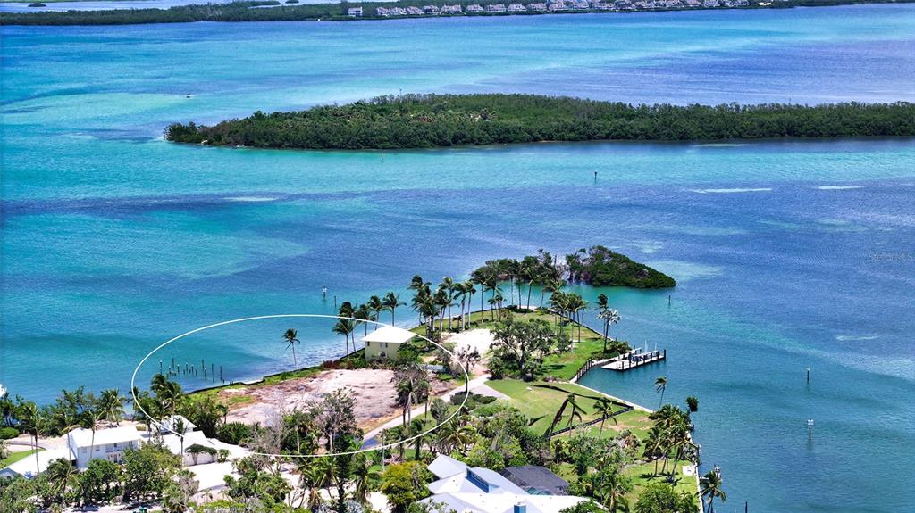 6516 Bayou Hammock Road Longboat Key, FL 34228 - Photo 5 of 20 a view of lake from yard